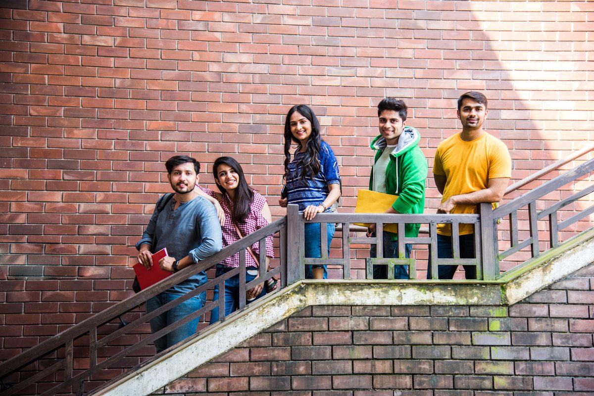 Group of Indian university students on campus steps